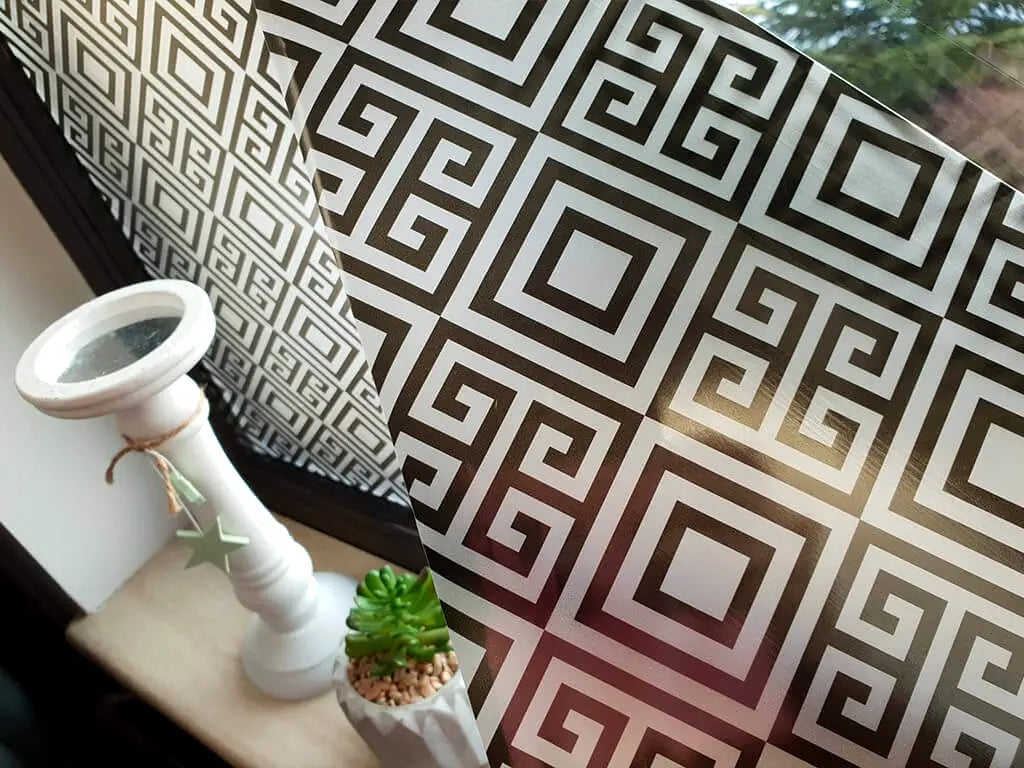 Self-adhesive decorative frosted window film Renata with black geometric pattern