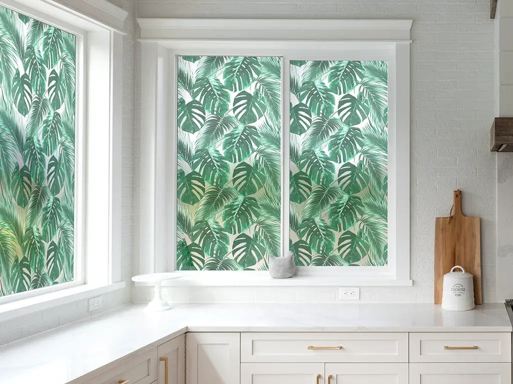 Self-adhesive decorative frosted window film Palmas with tropical pattern with green leaves