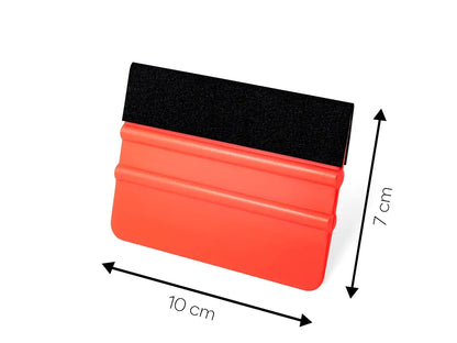 Squeegee for applying film, stickers and decals, made of plastic with one side covered in felt